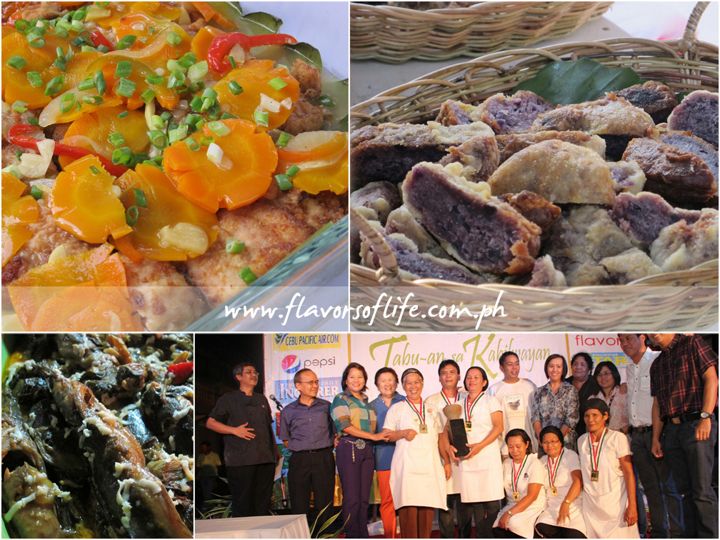Grand champion team Baranggay Nutrition Scholars of Santa Barbara with their dish entries Escabeche nga Isda, Buching Camote and Nilagpang nga Pantat