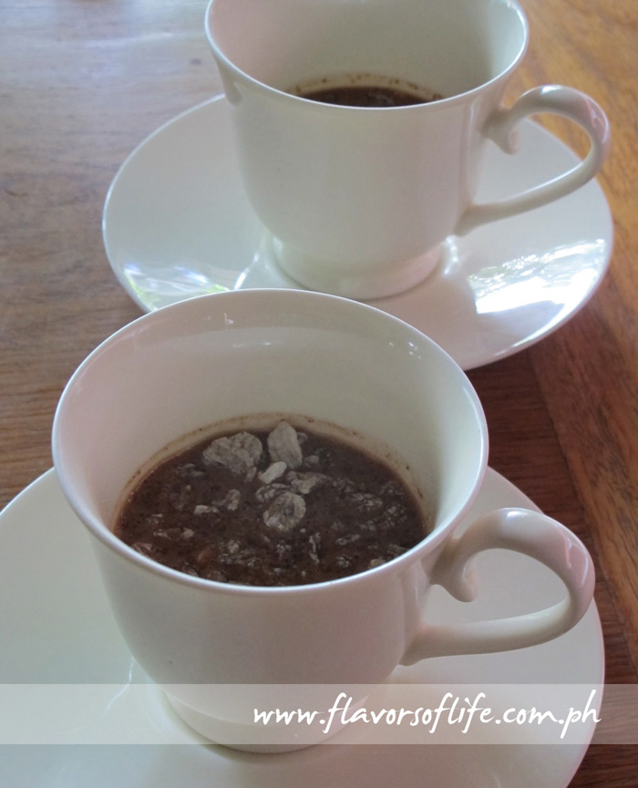 Tsokolate drink served with pinipig for crunch and texture