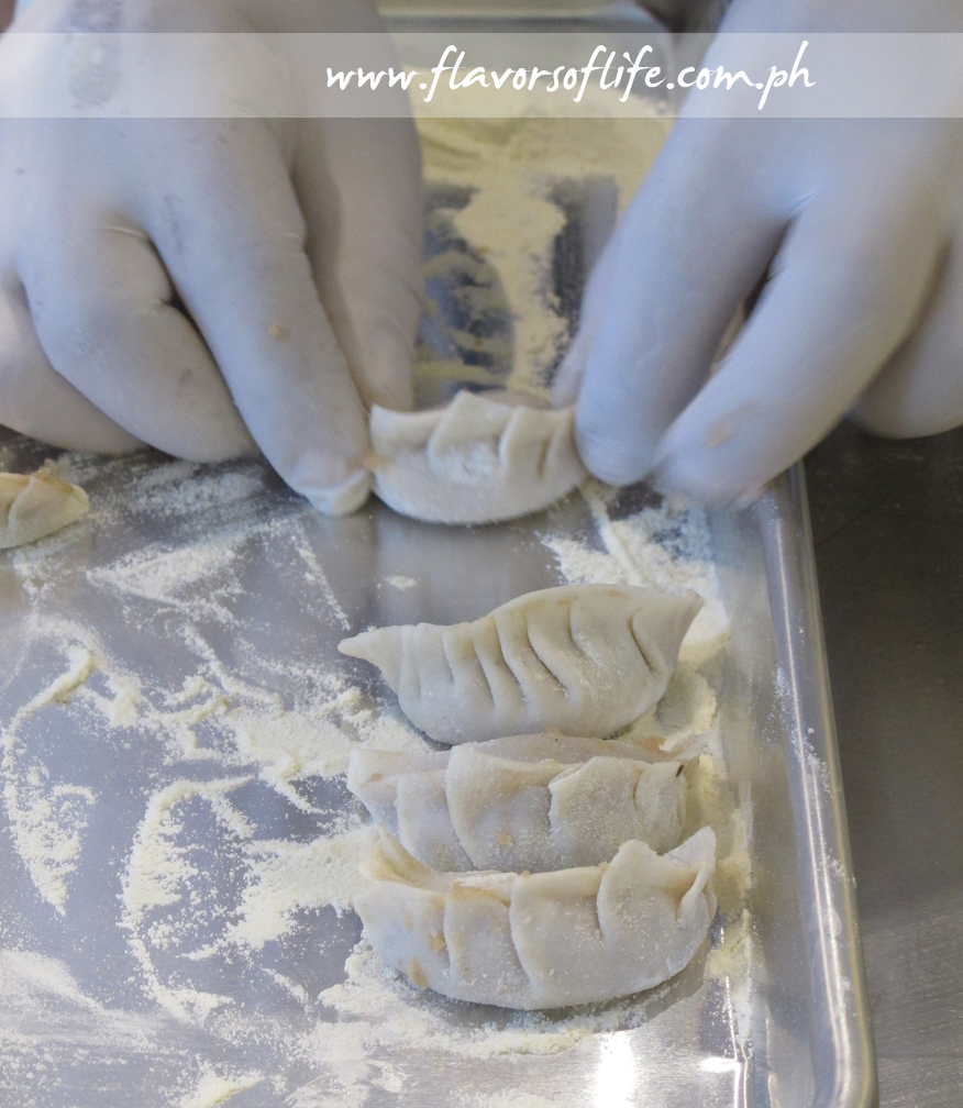Fresh dumplings being made at the Asian Station