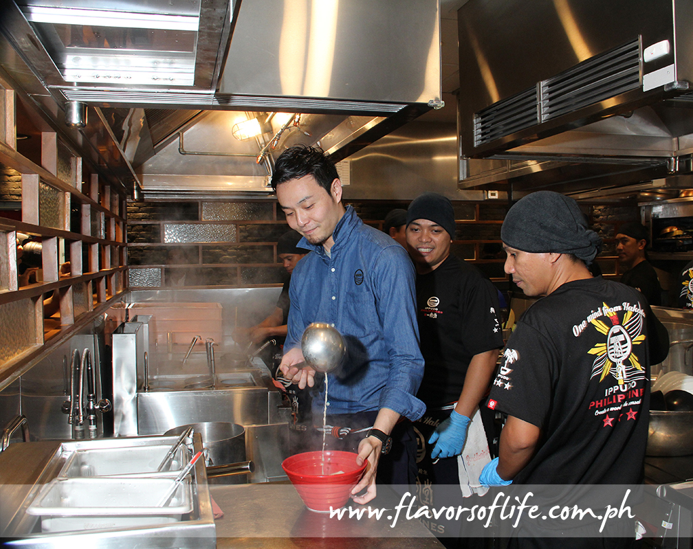 Ippudo Philippines operations manager Yota Shiiba in the kitchen with the staff