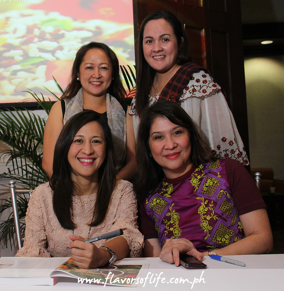 CSFI board treasurer Kristine Meehan and executive director Paula Camille Bondoc join CSFI chairperson Joy Belmonte and Salu-Salo editor-in-chief Mons Romulo during the book signing...