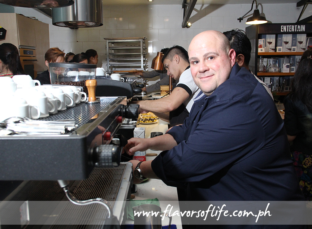 Di Bella Coffee founder and owner Phillip Di Bella doing what he does best--brewing cups of real good coffee