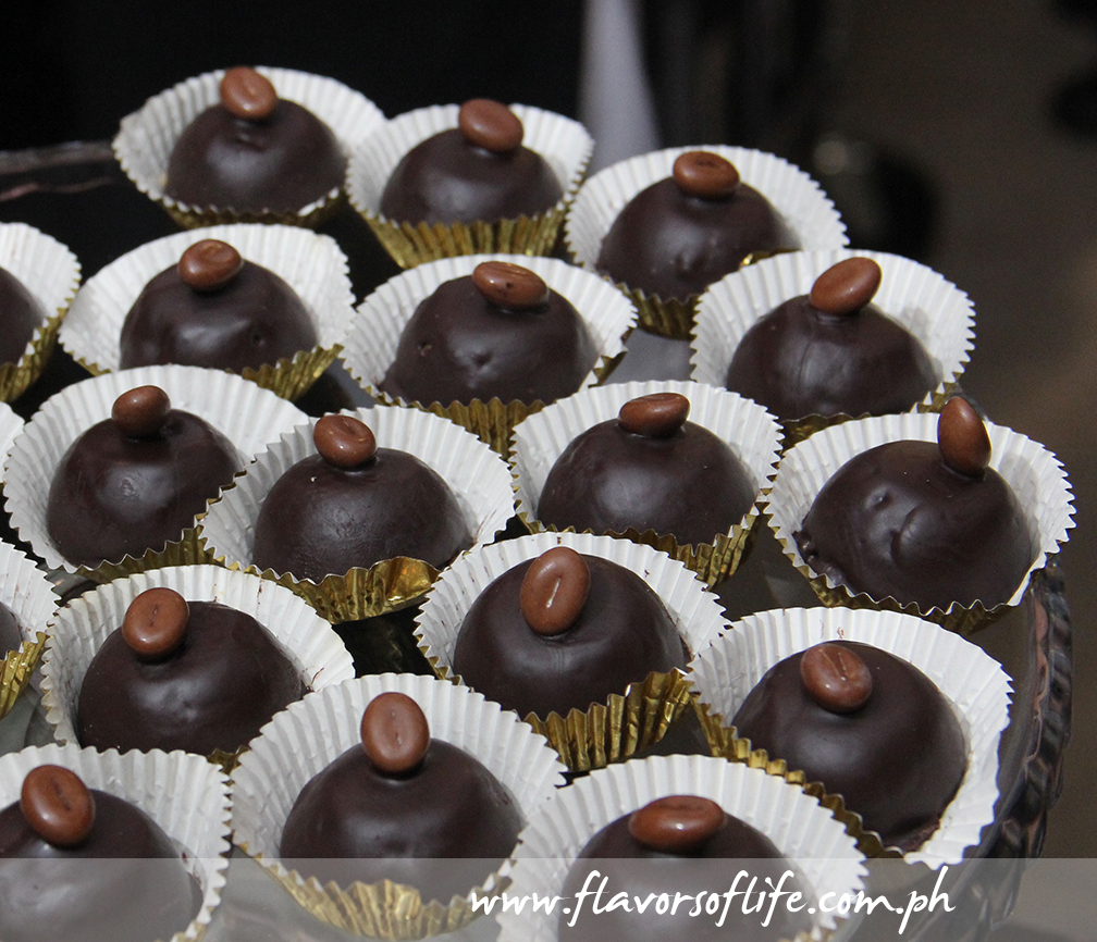 Chocolate bonbons with coffee bean topping