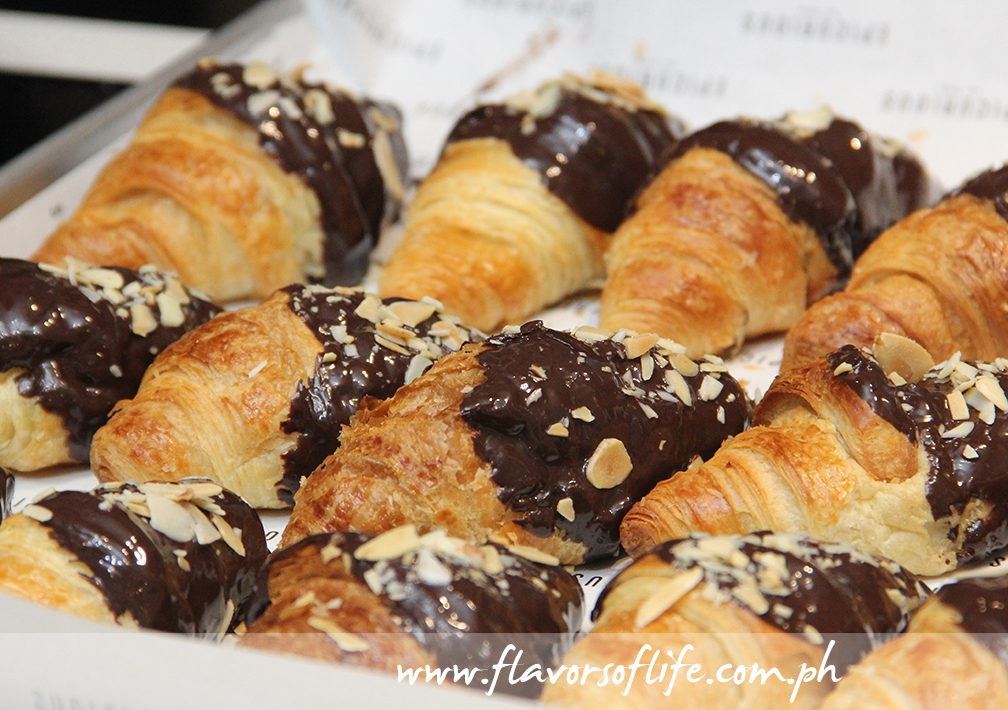 Crisp and flaky croissants dipped in chocolate