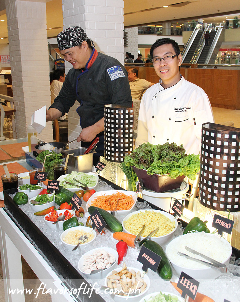 Cravings' head chef Jojo Derrada checking on the live cooking station of the Mongolian Buffet
