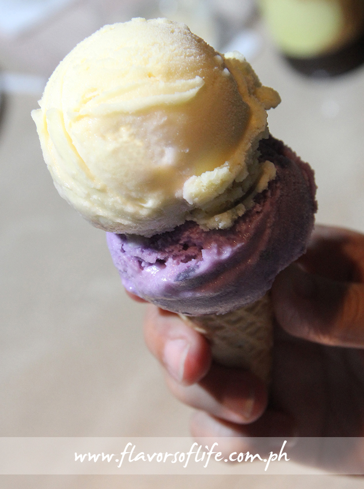 Queso and Ube Sorbetes from the 'dirty ice cream' cart, served on a sugar cone