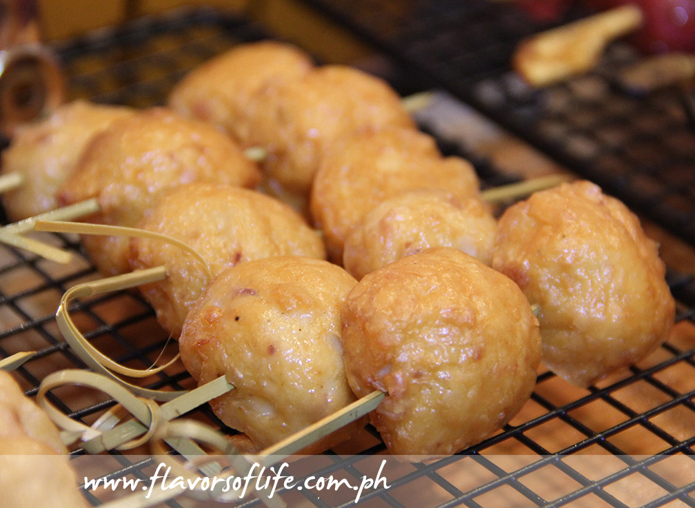 Squid Balls on skewers by Planet Grapes