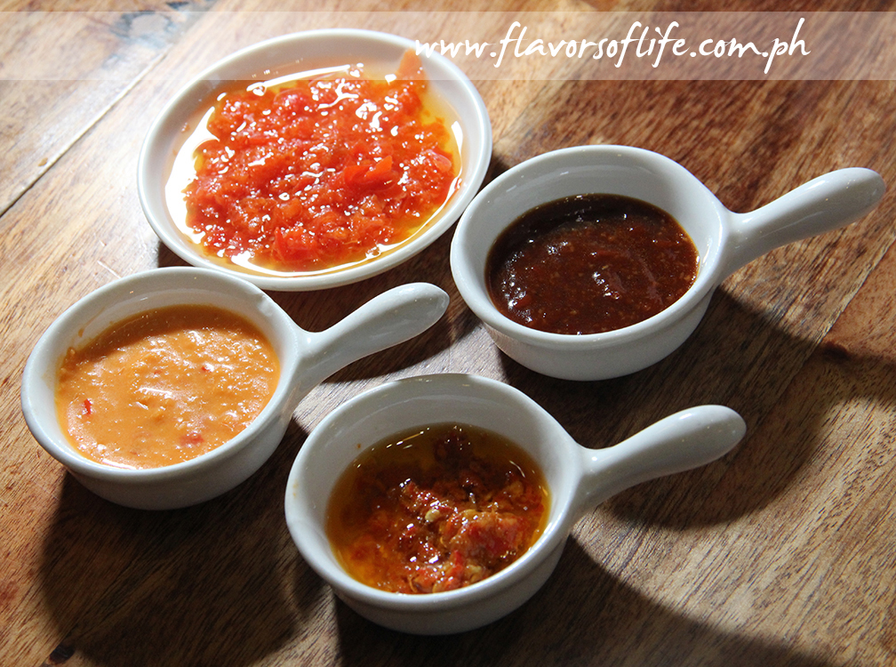 Gostoso's Piri Piri sauces, clockwise from top: Mild, Barbecue, Hot, and Garlic Lemon